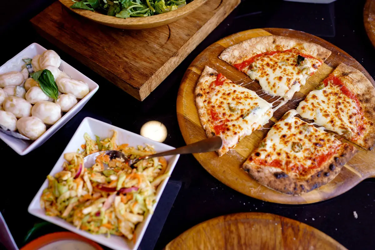 Frisky Pheasant pizza buffet spread at a Tree Top Escape wedding reception