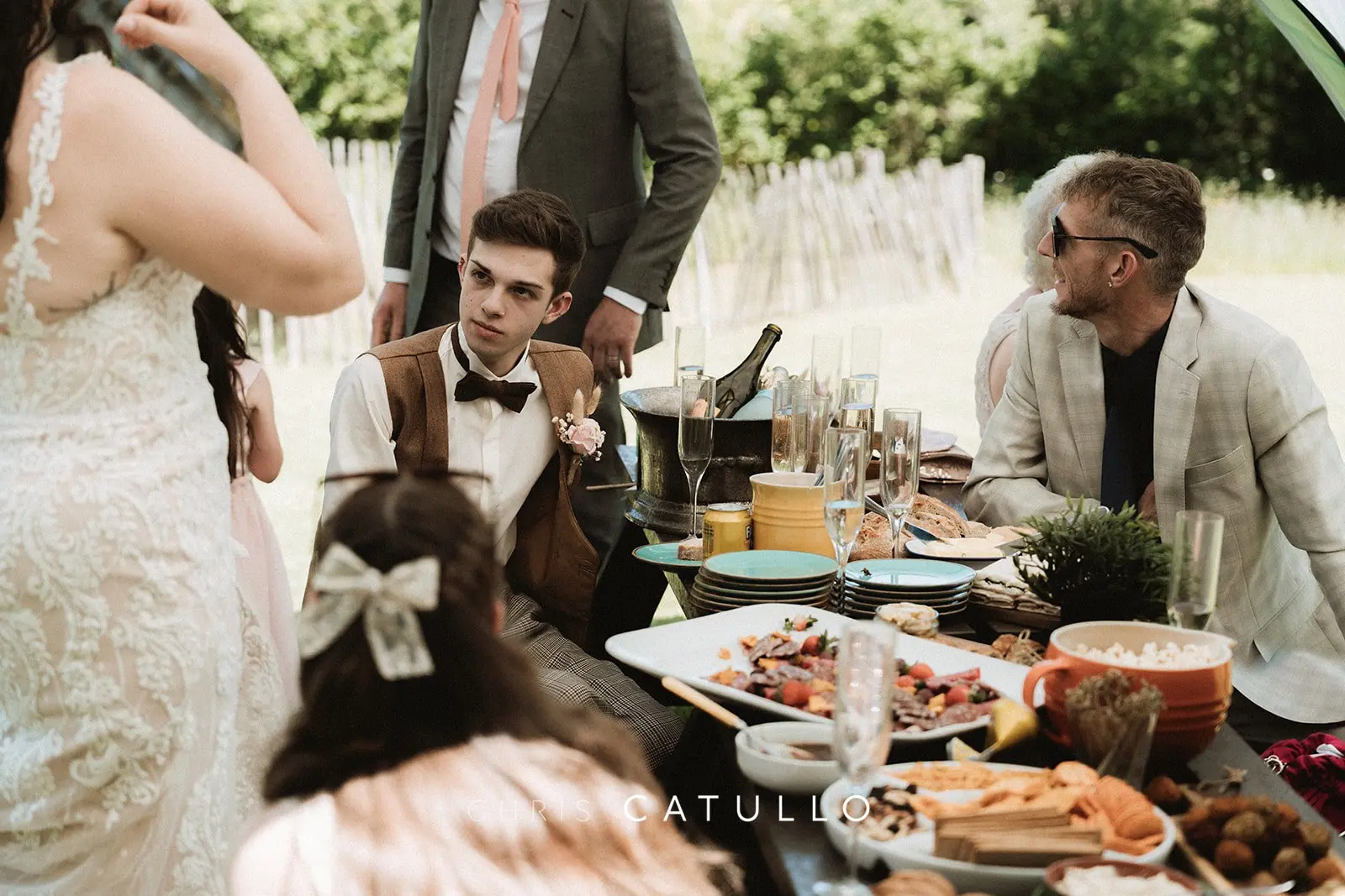 Guests enjoying the relaxed garden reception at Kelly and Dave's wedding