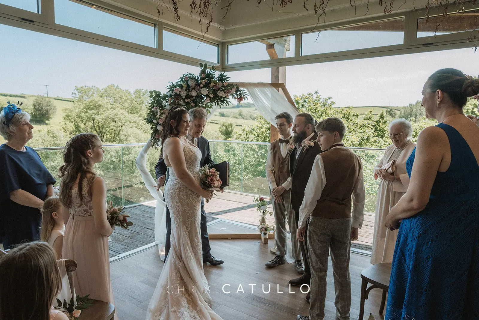 Kelly and Dave exchanging vows in The Nest at Tree Top Escape