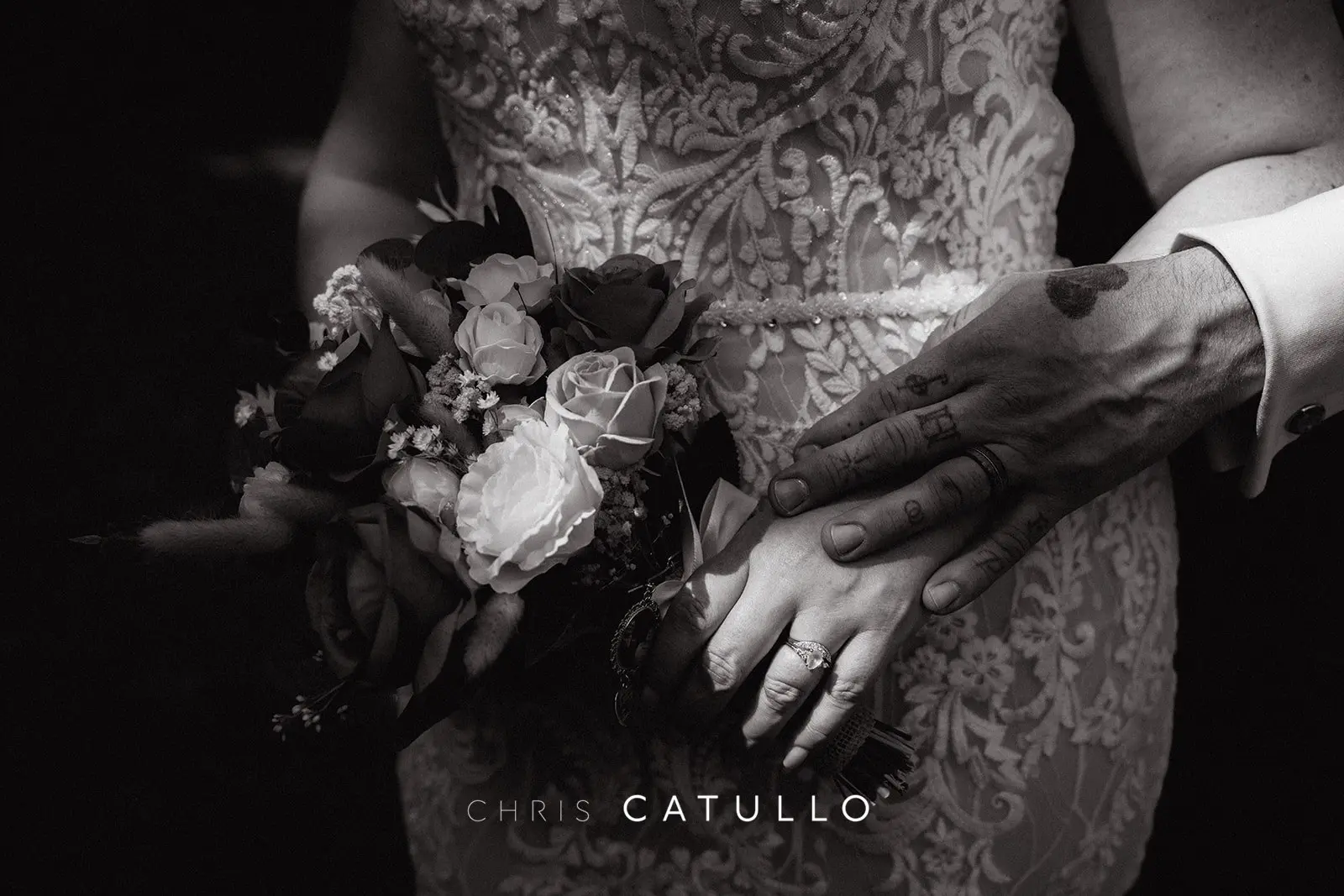 A close-up detail of Kelly and Dave's wedding rings